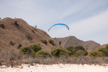 Paragliding, Pink Beach, Indonesia
