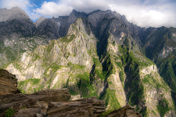 Trekking through Tiger Leaping Gorge, a scenic canyon on the Jinsha River, tributary of the upper...
