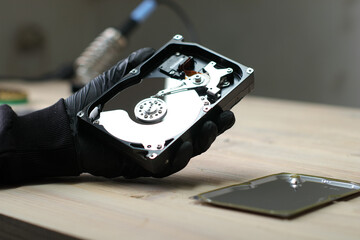 repairing the hard drive from the computer on the table