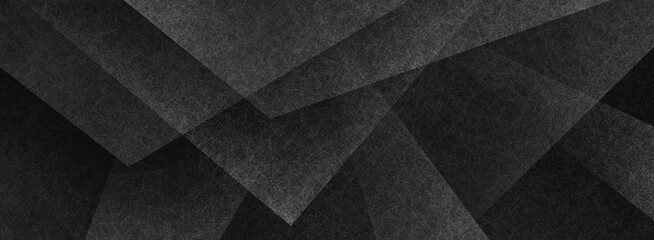 modern abstract black background texture with layers of white transparent material in triangle diamond and squares shapes in random geometric pattern with grunge texture design
