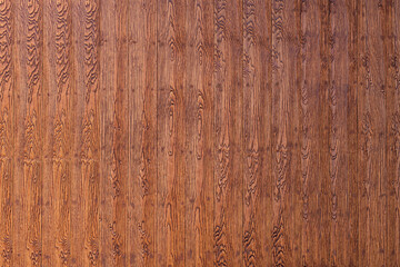 Fototapeta premium Brown shera wood panels are patterned like real wood used in the construction of houses. Beautiful brown shera wood wall texture use for background. Fake woods plank texture background with copy space
