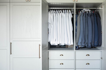 Male wardrobe furniture for business clothing neatly storage organization. Man closet with garment