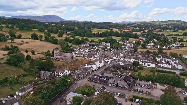 The village of Hawkshead, Cumbria UK. Aerial drone footage. Moving backwards.