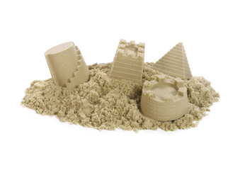 Sand Castles of kinetic sand and toys isolated on white background.