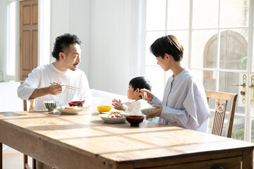 Asian family table with children who love rice