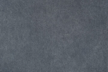 Texture of gray knitted fabric. Grey cloth background. Knitted pattern