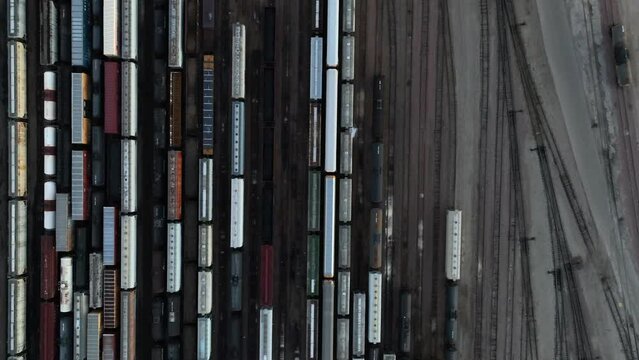 Top down aerial of train switching yard. Freight and rail transportation theme.