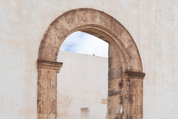 Convent Betancuria, side-view with entrance and view of opposite wall with pigeon, Fuerteventura