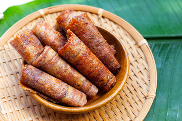 Sun dried banana roll snacks