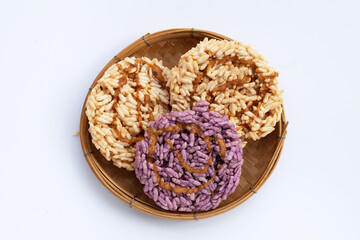 Rice cracker with coconut palm sugar on white