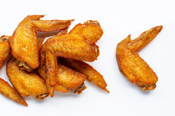 Fried chicken wings on white background.