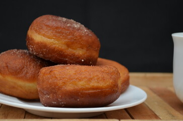 Beautiful handmade donuts covered in chocolate and sugar
