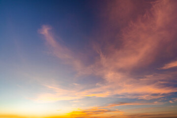 Beautiful dramatic and colorful sky at sunset over the mountains