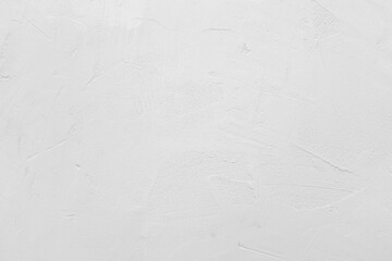 White cement or stone wall background and rough textured