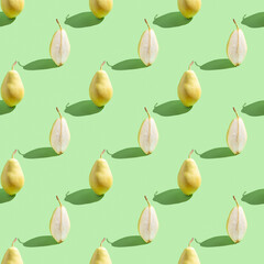 Seamless pattern with fresh pear on green background.
