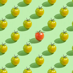 Seamless pattern with cherry tomatoes on green mint background.