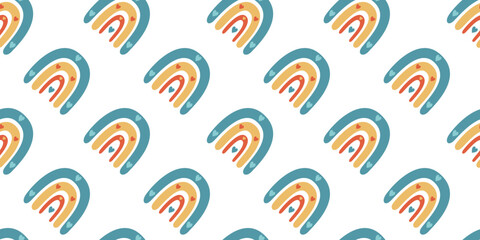 Fototapeta premium Vector flat hand drawn seamless pattern with cute rainbows. Flat vector hippy boho illustration