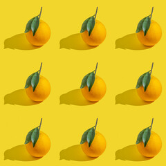 Seamless pattern with fresh grapefruit on yellow background.
