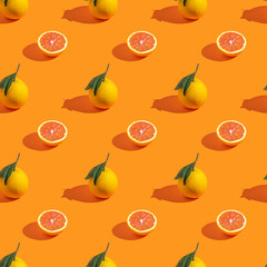 Seamless pattern with fresh red orange on yellow background.