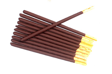Biscuit cookie sticks in cacao coating on white background / Chocolate, cookies, biscuits coated bar.
