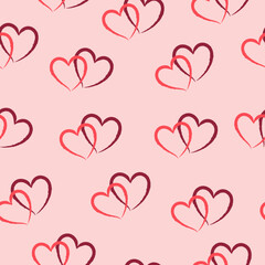 Abstract seamless pattern with pink and red hearts on a pink background. Hand drawn style