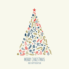 Greeting card concept with the words Merry Christmas. Abstract Christmas tree shape arranged with festive symbols