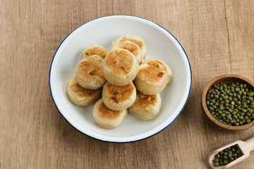 Bakpia, Bakpia Pathok is a typical Yogyakarta food made from a mixture of green beans, cheese and sugar, which is wrapped in flour, then baked.
