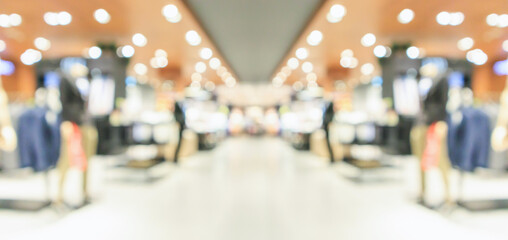 Abstract blur clothing boutique display interior of shopping mall background