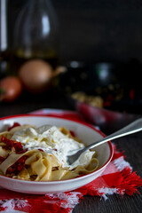 pasta with burrata cheese, beautiful serving, italian cuisine