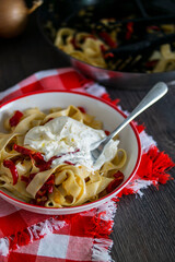 pasta with burrata cheese, beautiful serving, italian cuisine