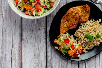 Healthy dinner on wooden background