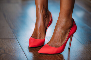 Red high heels - obrazy, fototapety, plakaty