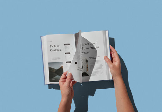 Hands Turning Pages of a Hardcover Book Mockup With Custom Background