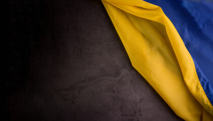 National Flag of Ukraine. Fabric waved Blue and Yellow Flag close up.