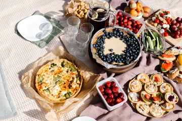 Rest on a picnic with a funeral mood. Picnic food in nature. High quality photo