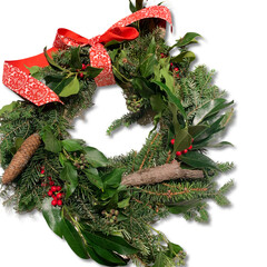 christmas wreath with red ribbon and red Holly berries 