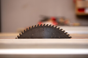 Sawmill close-up disc saw. Furniture production sawing parts for wooden furniture. Industrial plant.
