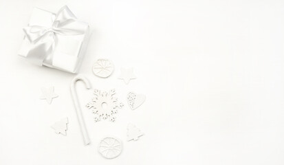 Obraz na płótnie Canvas Gift white box with a bow on a white background. Holiday concept.Christmas. New Year.