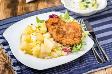 pork chop with potatoes and salads