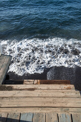 white  empty beach huts in Procida