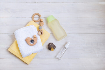 Baby supplies on table on white background. Space for text.