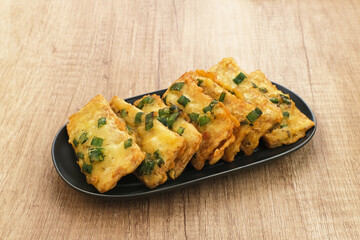 Tempe Mendoan, traditional fried tempeh, one of popular food from Indonesia.
