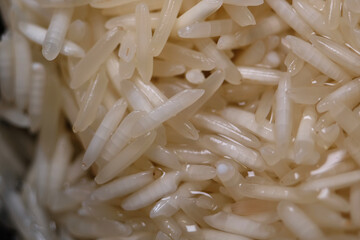 Macro texture of clean uncooked basmati rice 