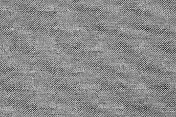 Gray checkered fabric background.