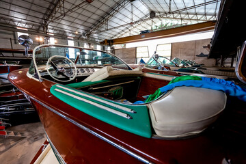 Fototapeta na wymiar Classic wooden motor boats in shipyard