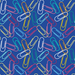Seamless pattern with colorful paper clips on blue background