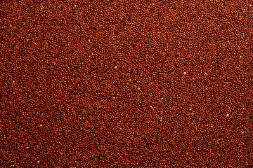 Healthy Organic Food. Black Quinoa Macro photo. On a gray stone background. Top view.