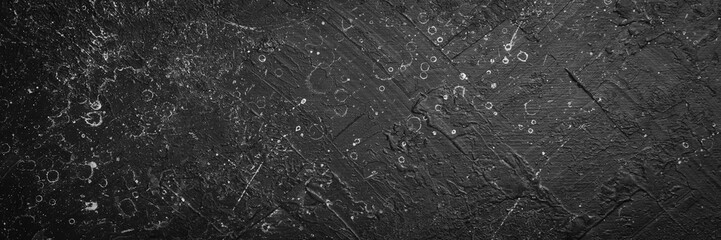 Black old stone background. Top view. Free copy space.