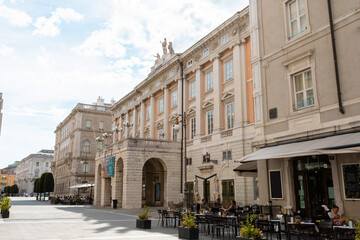 Fototapeta na wymiar Historic Buildings on Piazza della Borsa in Triest.