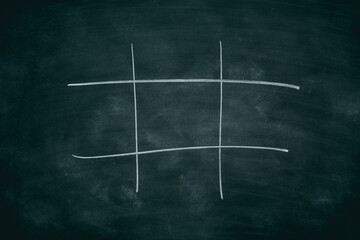 Abstract Tic Tac Toe Game Competition. XO Win Challecge Concept on black board